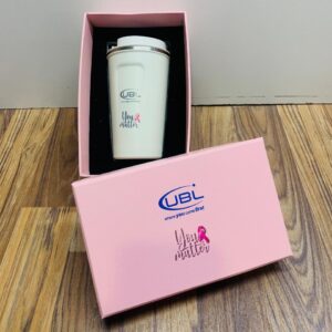 Pinktober “You Matter” Corporate Gift Set featuring a white travel mug with pink ribbon logo in a luxury pink box – ideal breast cancer awareness corporate gift