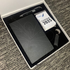 Employee New Year Gift Box with black notebook, metal pen, 2025 mini calendar, and USB keychain